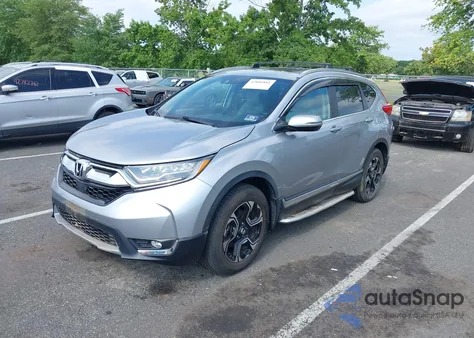 2017 Honda Cr-V Touring z USA, uszkodzony, nr VIN 2HKRW2H96HH612528